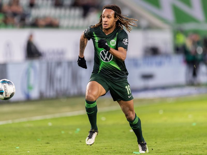 Kevin Mbabu of VfL Wolfsburg runs with the ball during the Bundesliga match between VfL Wolfsburg and Borussia Moenchengladbach at Volkswagen Arena on December 15, 2019 in Wolfsburg, Germany. (Photo by Boris Streubel/Bongarts/Getty Images)