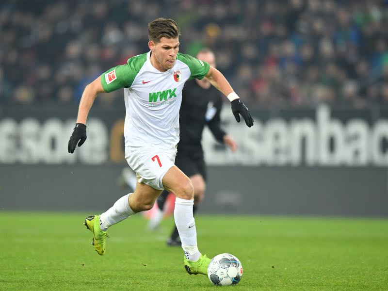 Florian Niederlechner of FC Augsburg plays the ball during the Bundesliga match between FC Augsburg and Fortuna Duesseldorf at WWK-Arena on December 17, 2019 in Augsburg, Germany. (Photo by Sebastian Widmann/Bongarts/Getty Images)