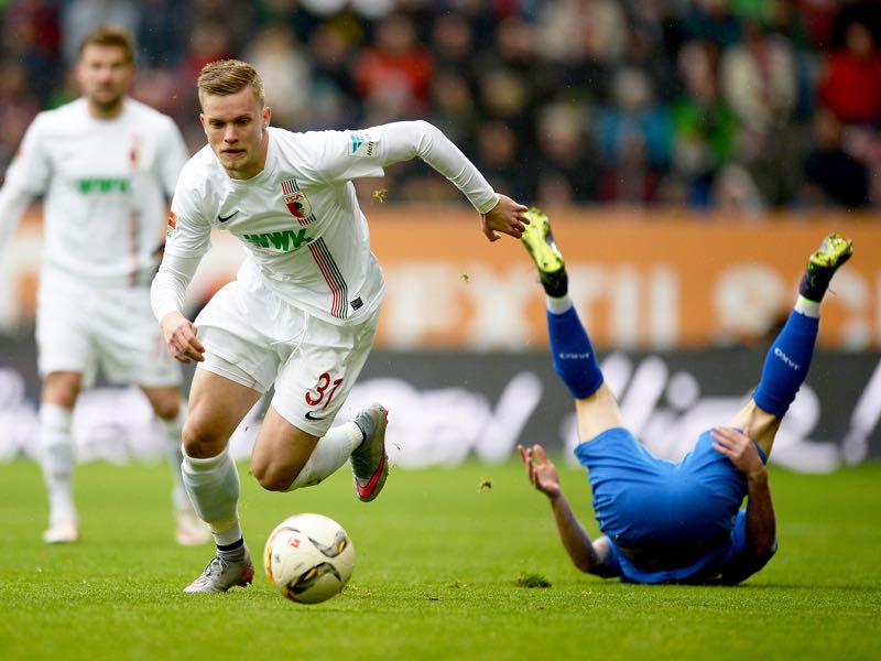 Kevin Bright of AC Milan U19 competes for the ball with Michael News  Photo - Getty Images